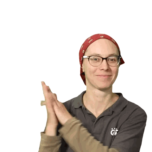 Woman Wearing Glasses and Bandana Clapping