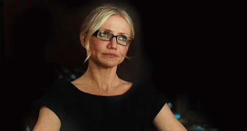 Woman Wearing Glasses and Black Shirt Talking