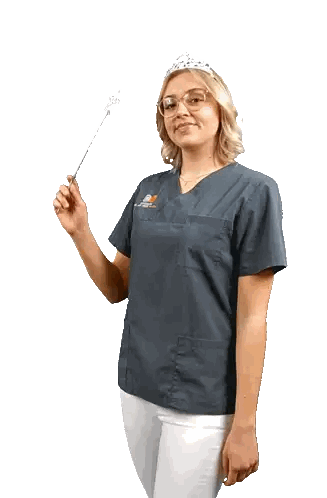 Woman Wearing Glasses and Crown in Dental Scrub
