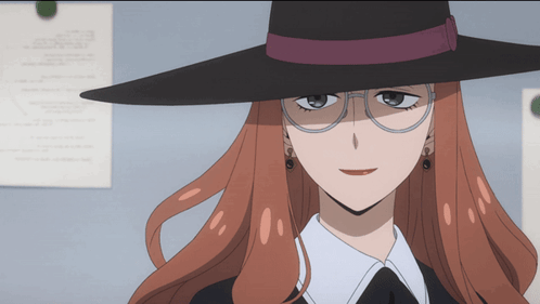 Woman Wearing Glasses and Hat Smiling