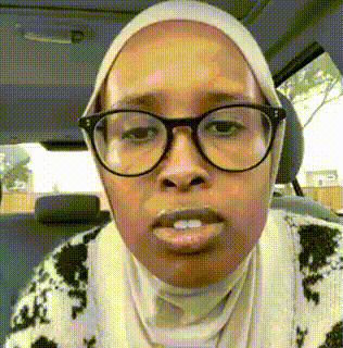 Woman Wearing Glasses and Head Scarf in Car