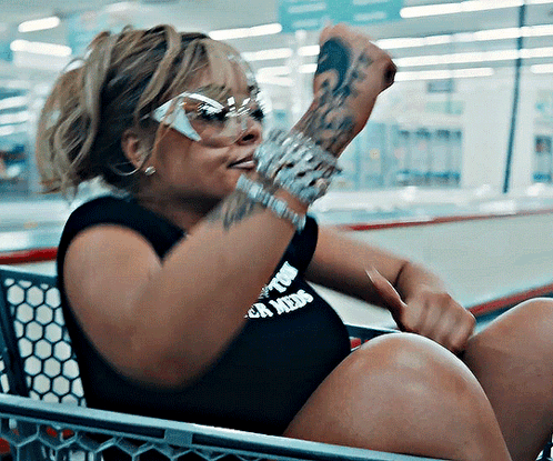 Woman Wearing Glasses And I M A Bitch Shirt GIF