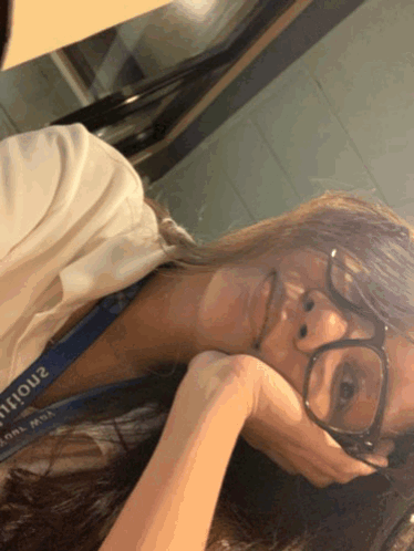 Woman Wearing Glasses and Lanyard 2ntour