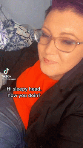 Woman Wearing Glasses and Orange Shirt