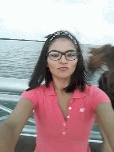 Woman Wearing Glasses And Pink Abercrombie Shirt GIF