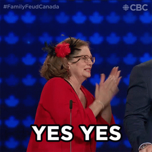 Woman Wearing Glasses and Red Dress Saying Yes