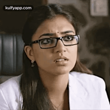 Woman Wearing Glasses And White Coat GIF