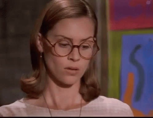 Woman Wearing Glasses and White Shirt