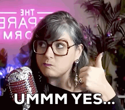 Woman Wearing Glasses Giving Thumbs Up GIF