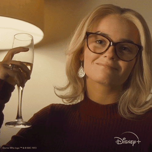 Woman Wearing Glasses Holding Wine GIF