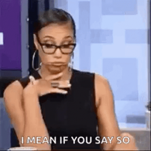 Woman Wearing Glasses Making Face Saying I Mean If You Say So