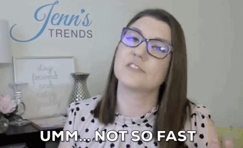 Woman Wearing Glasses Making Funny Face Saying Not So Fast