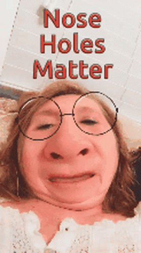 Woman Wearing Glasses Making Funny Face