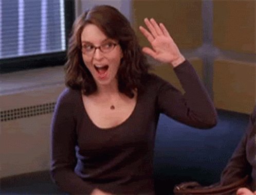 Woman Wearing Glasses Waving