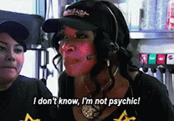 Woman Wearing Hat and Headphones Saying I Don't Know