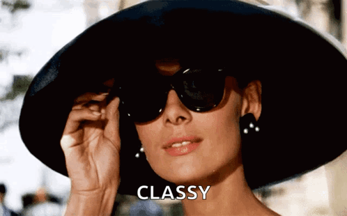 Woman Wearing Hat and Sunglasses with Classy Text