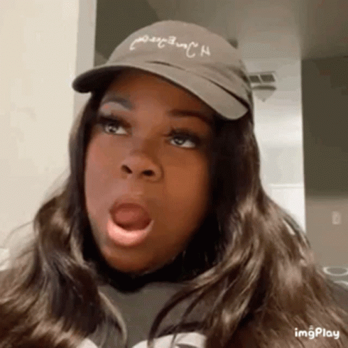 Woman Wearing Hat Making Funny Face