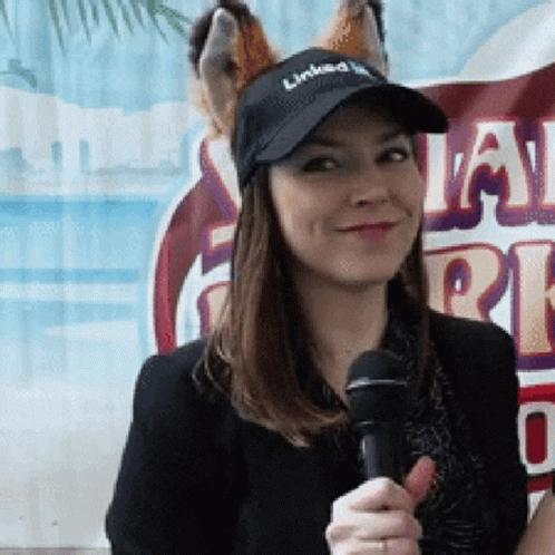Woman Wearing Hat Saying Linked GIF
