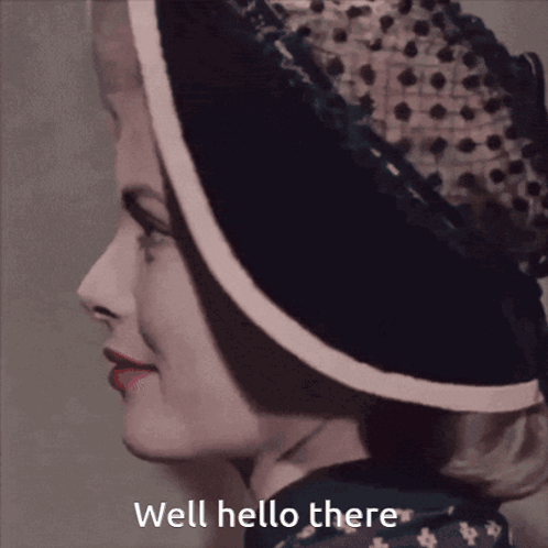 Woman Wearing Hat Saying Well Hello There GIF
