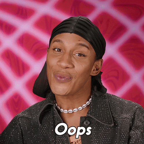 Woman Wearing Headband and Oops Necklace