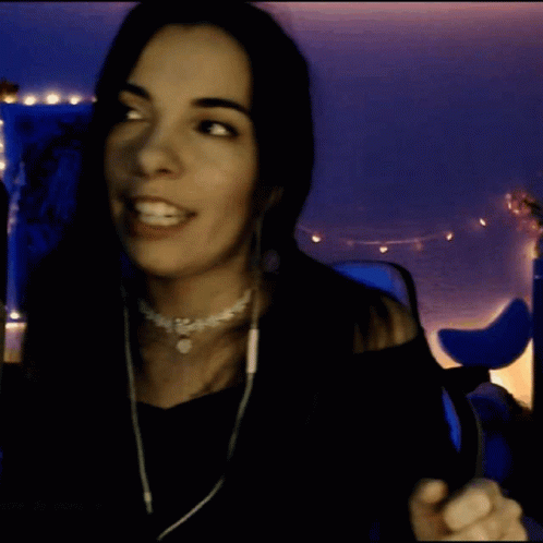 Woman Wearing Headphones and Choker Smiling