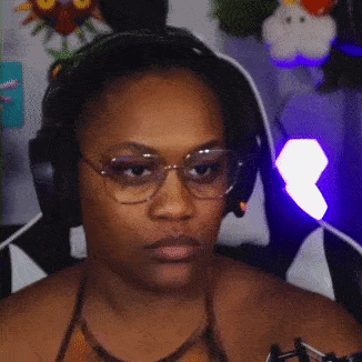 Woman Wearing Headphones And Glasses GIF