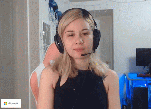 Woman Wearing Headphones and Microphone