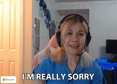 Woman Wearing Headphones and Microphone Saying Sorry