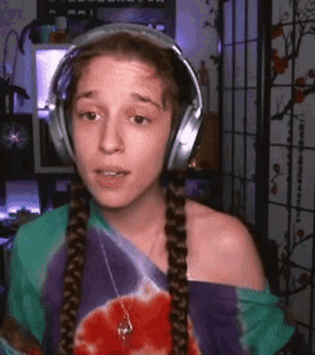 Woman Wearing Headphones and Tie Dye Shirt