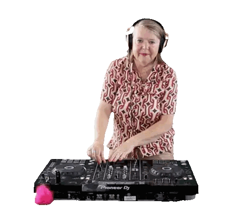 Woman Wearing Headphones at DJ Mixer