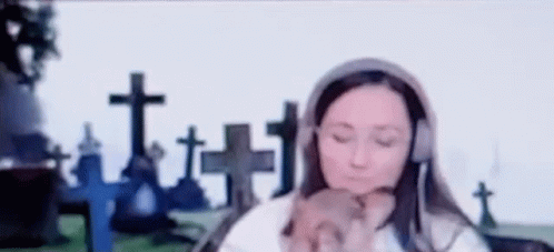 Woman Wearing Headphones Holding Puppy GIF