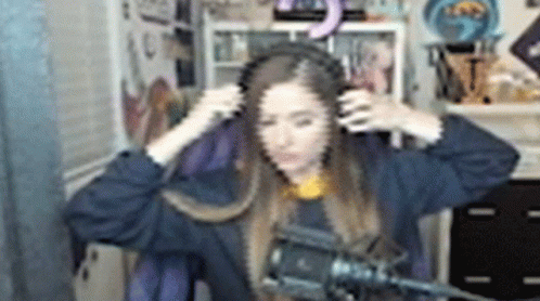Woman Wearing Headphones in Front of Microphone