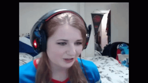 Woman Wearing Headphones Making Funny Face