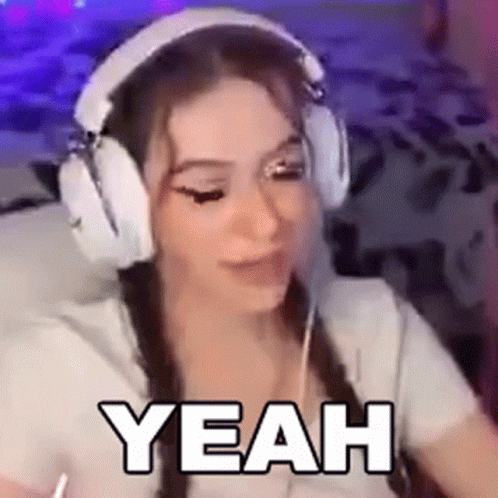 Woman Wearing Headphones Making Funny Face GIF