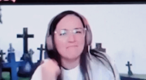 Woman Wearing Headphones Making Funny Face GIF