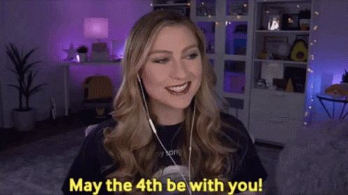 Woman Wearing Headphones Saying May the 4th Be With You
