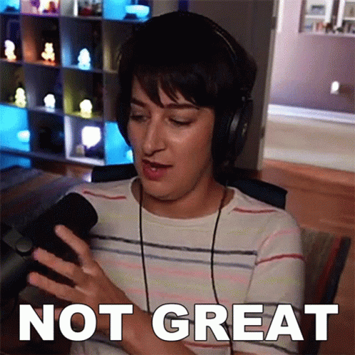 Woman Wearing Headphones Saying Not Great GIF