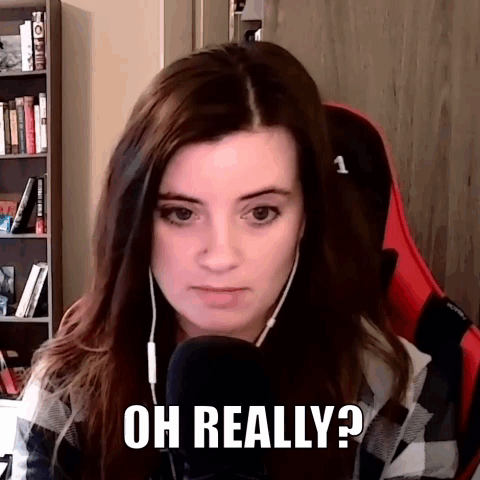 Woman Wearing Headphones Saying Oh Really