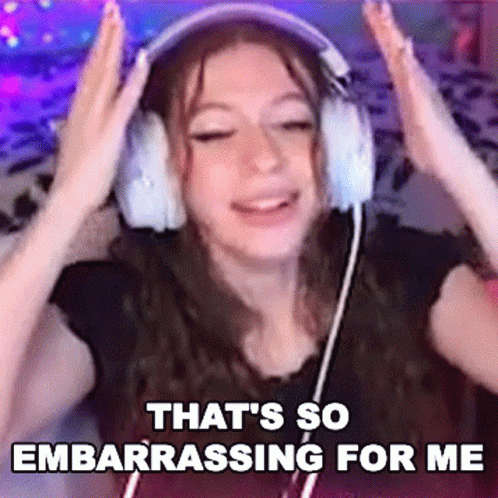 Woman Wearing Headphones Saying That's So Embarrassing