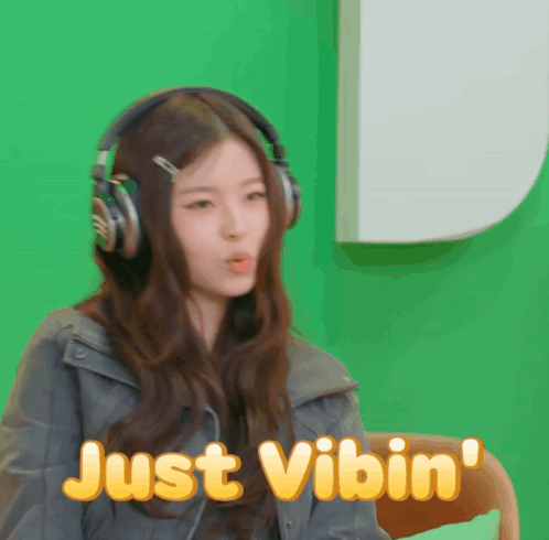 Woman Wearing Headphones Says Just Vibin