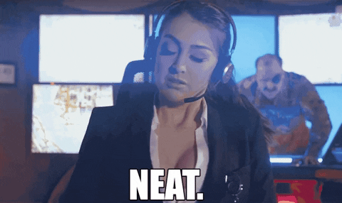 Woman Wearing Headphones Says Neat GIF