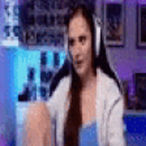 Woman Wearing Headphones Sitting At Computer GIF
