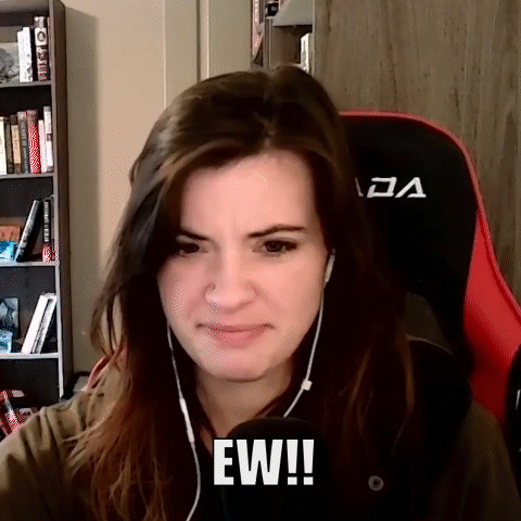 Woman Wearing Headphones With Ew On Face GIF