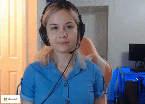 Woman Wearing Headphones with Microsoft Logo