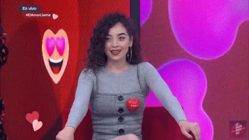 Woman Wearing Heart Sweater with Karol