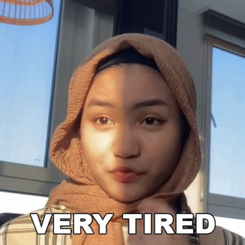 Woman Wearing Hijab Looking Very Tired