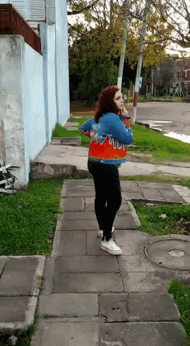 Woman Wearing Jacket Saying Flame GIF
