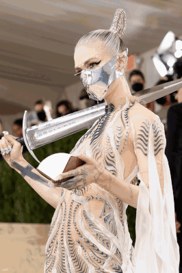 Woman Wearing Mask Holding Sword