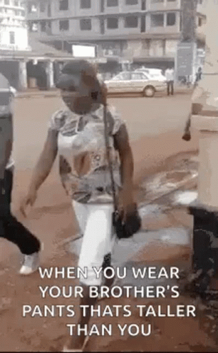 Woman Wearing Pants Taller Than Her