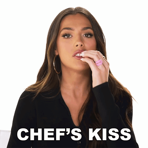 Woman Wearing Pink Heart Ring Chef's Kiss